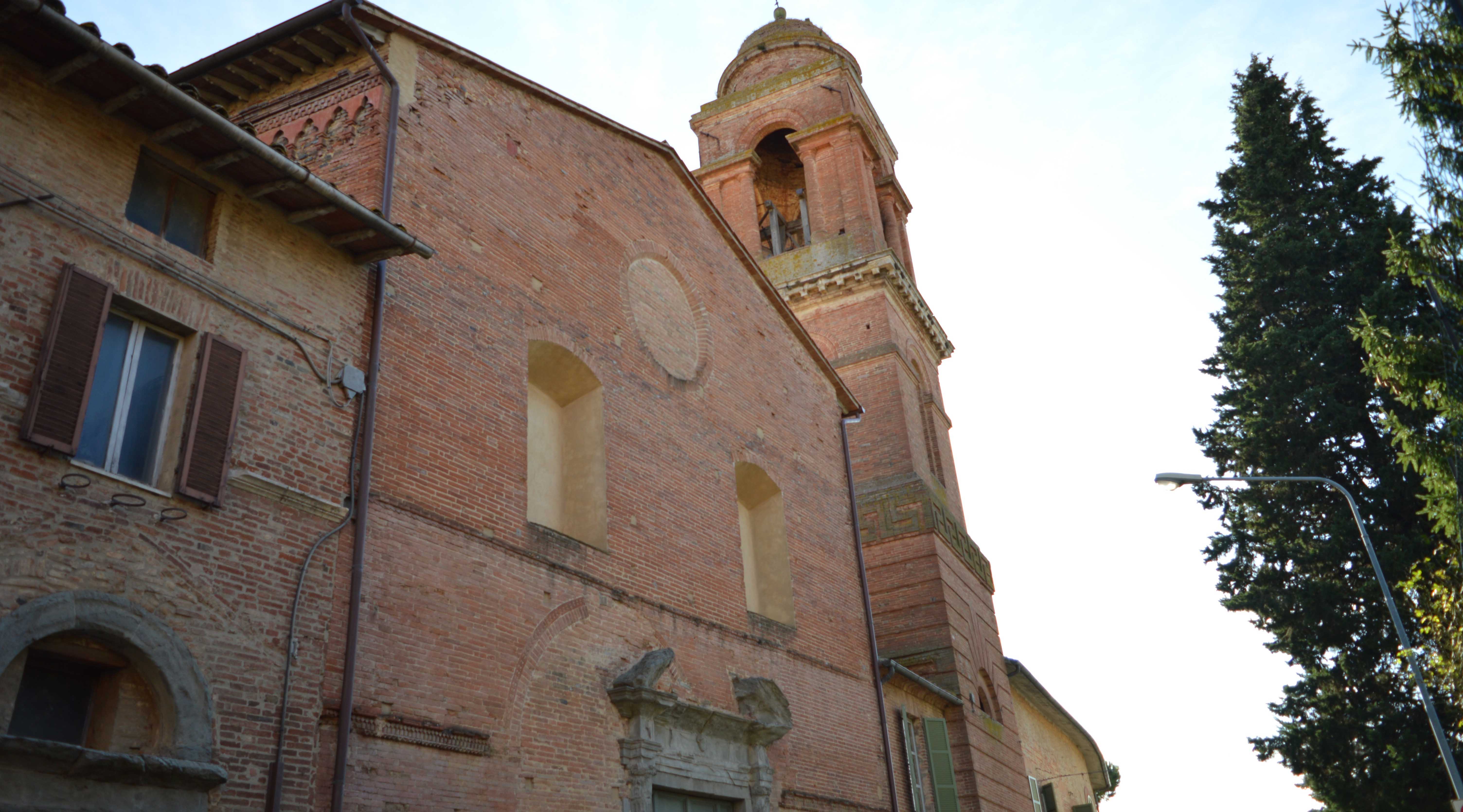 View of the Gothic Church of Santa Maria dei Servi with its imposing bell tower rising in the background.