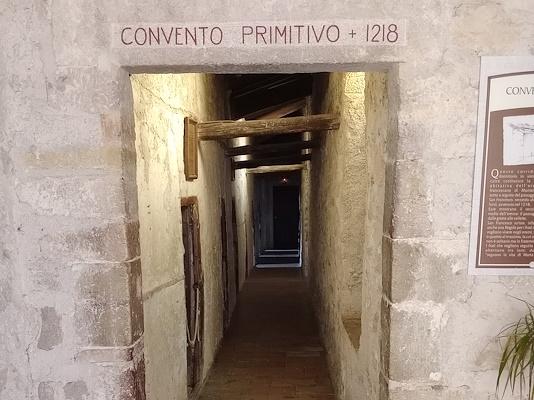 Entrance to the Convent inside the Hermitage of St. Francis where “Convento Primitivo 1218”is written above the entrance door