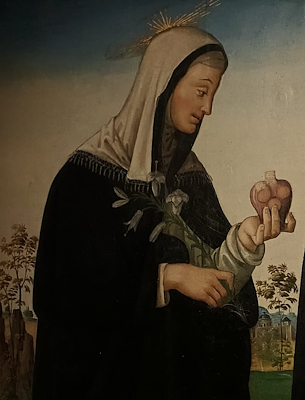 Painting of Blessed Margaret in a black robe with a golden halo, holding a heart and a lily, set against a landscape background.