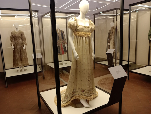 Alexandrine Bonaparte's Empire-style dress, with polka dot fabric, balloon sleeves and a train