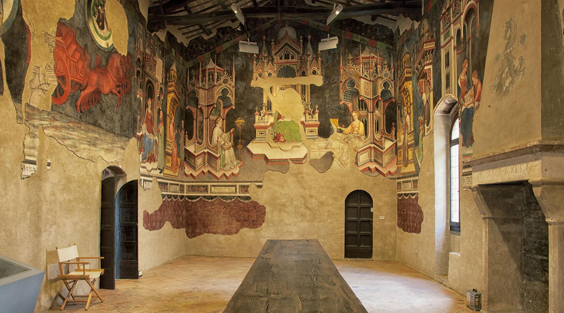 Loggia decorata con le storie della fondazione di Roma che allude alla potenza di Roma e per analogia a quella di Foligno